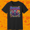 A black short-sleeve crewneck t-shirt featuring a vibrant, colorful graphic print of Dracula with neon-style text and artwork. The shirt is displayed flat against a bright orange background patterned with Halloween motifs like ghosts, bats, and spiderwebs.